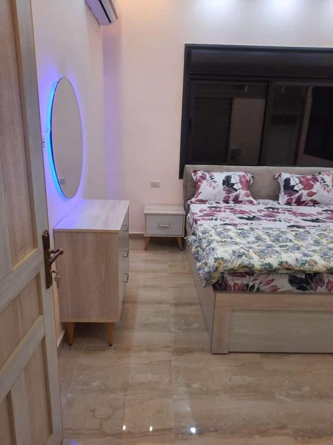 Lotus Housing For Furnished Apartments Jarash Bagian luar foto