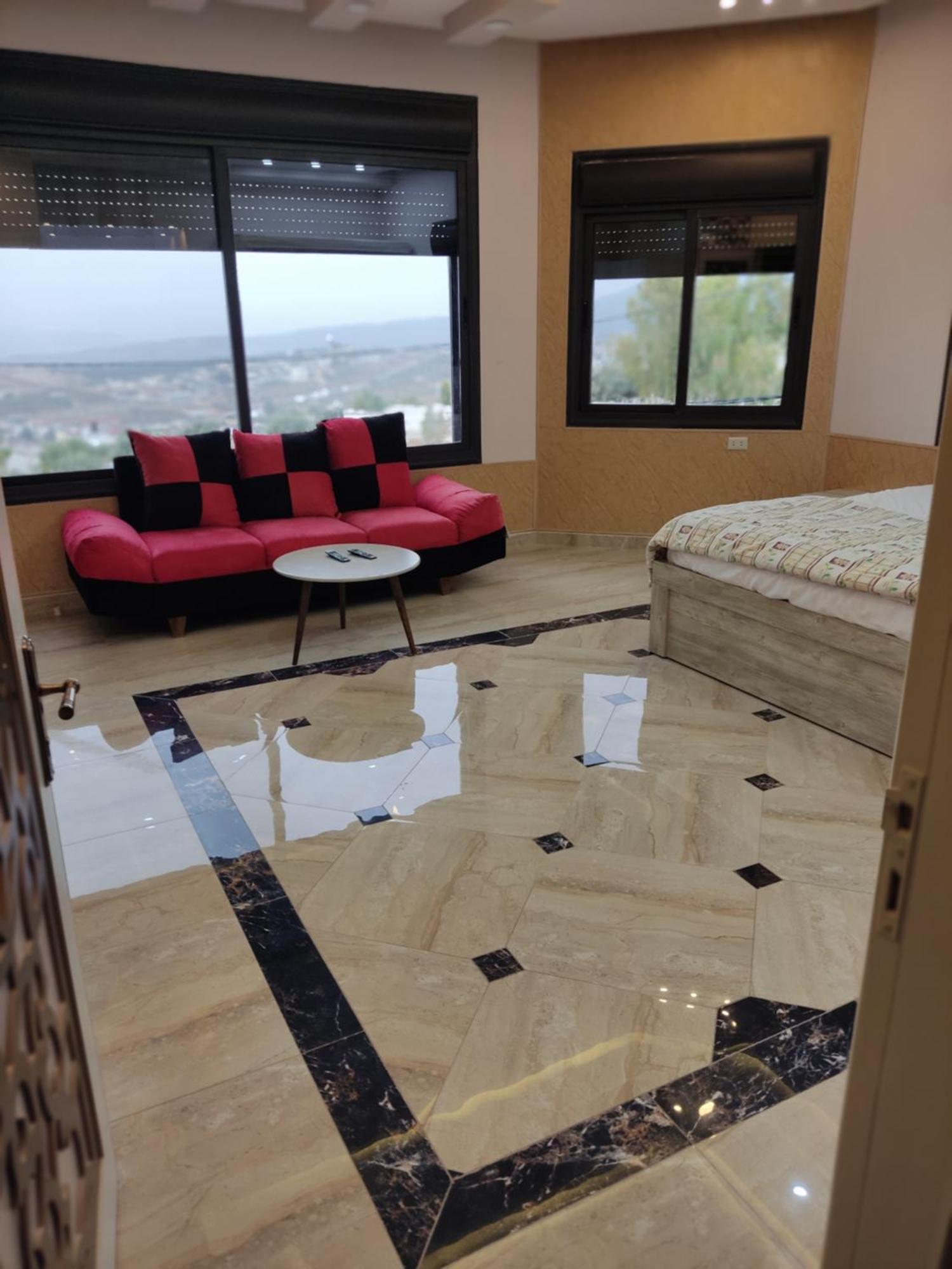 Lotus Housing For Furnished Apartments Jarash Bagian luar foto